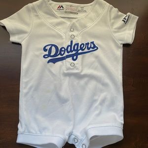Baby dodger jersey. Tiny bit of discoloration, as pictured.